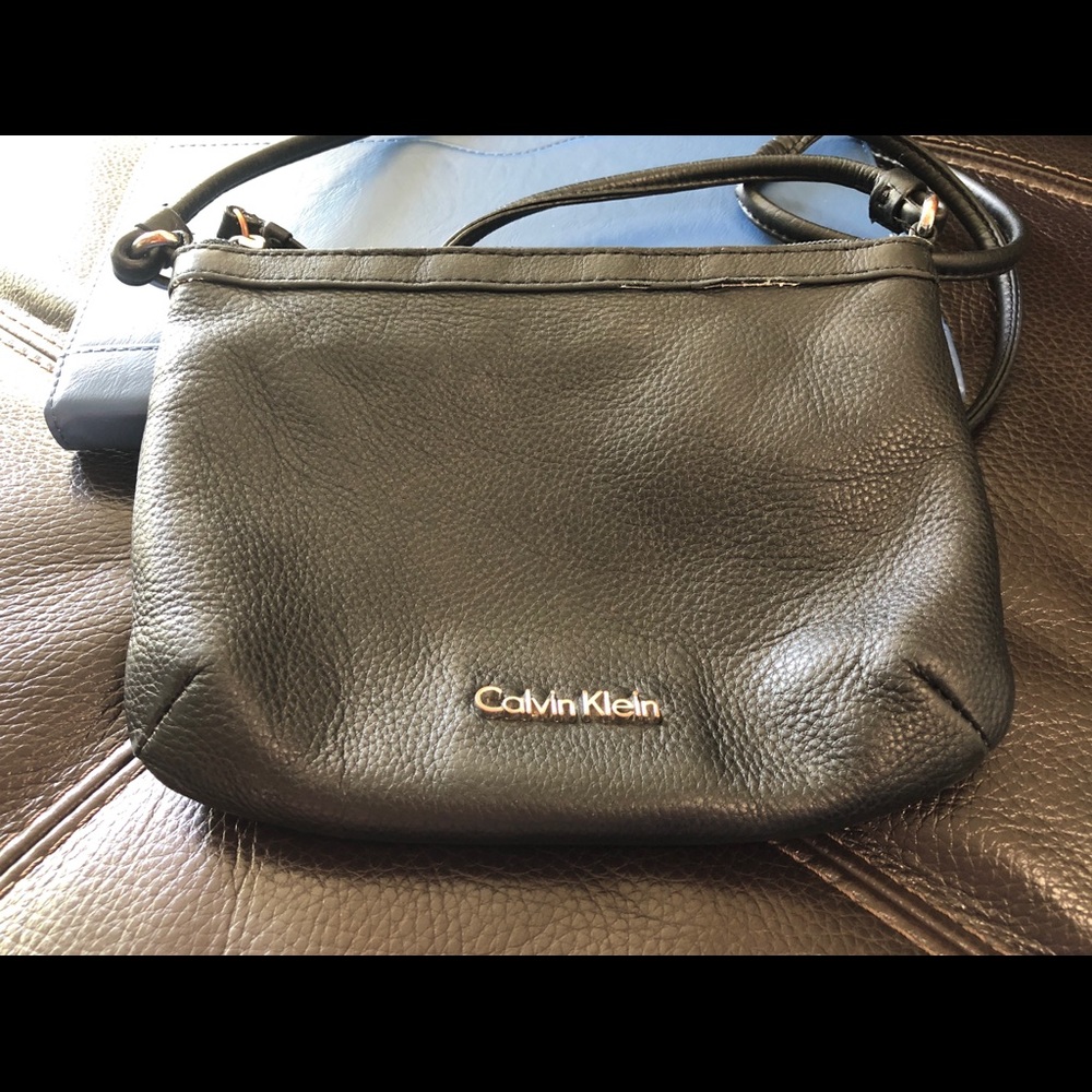 Calvin Klein black leather crossbody purse.